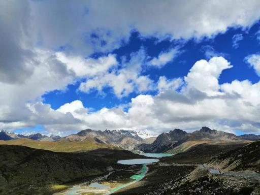 云上之巅，终遇雪山，麦芒在路上：香格里拉环线骑行